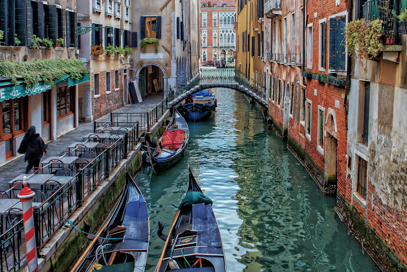 A working back canal lined with boats