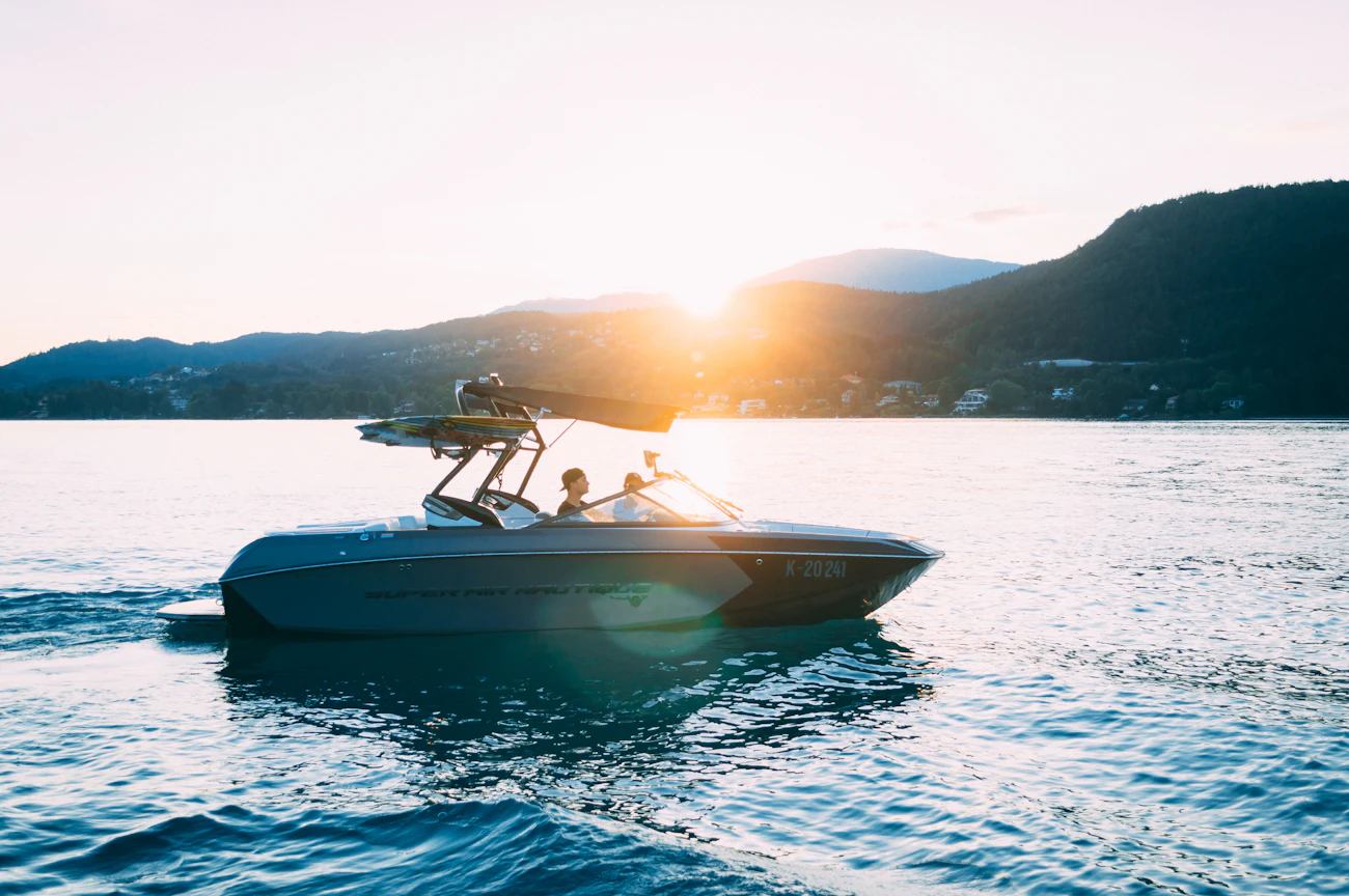 A boat on the bay at golden hour