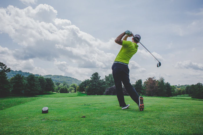 A golf course fairway at golden hour