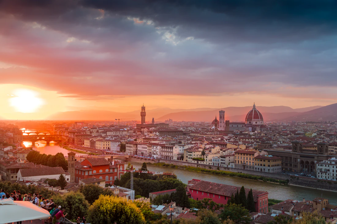 Florence glowing at golden hour, seen from above