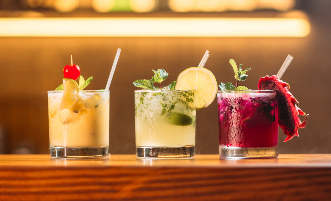 Cocktails catching the evening light at a bar