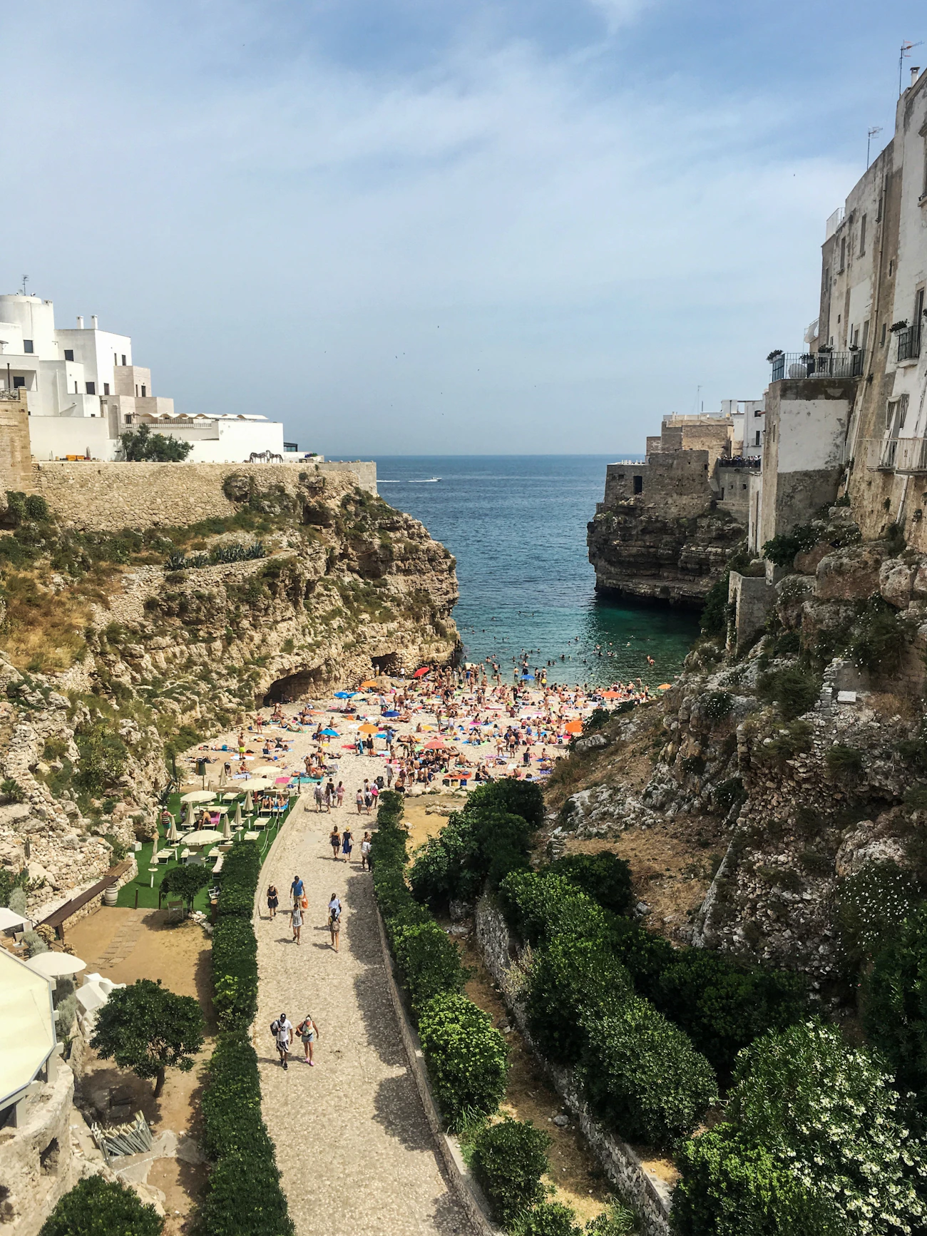 A busy little beach tucked under the cliffs