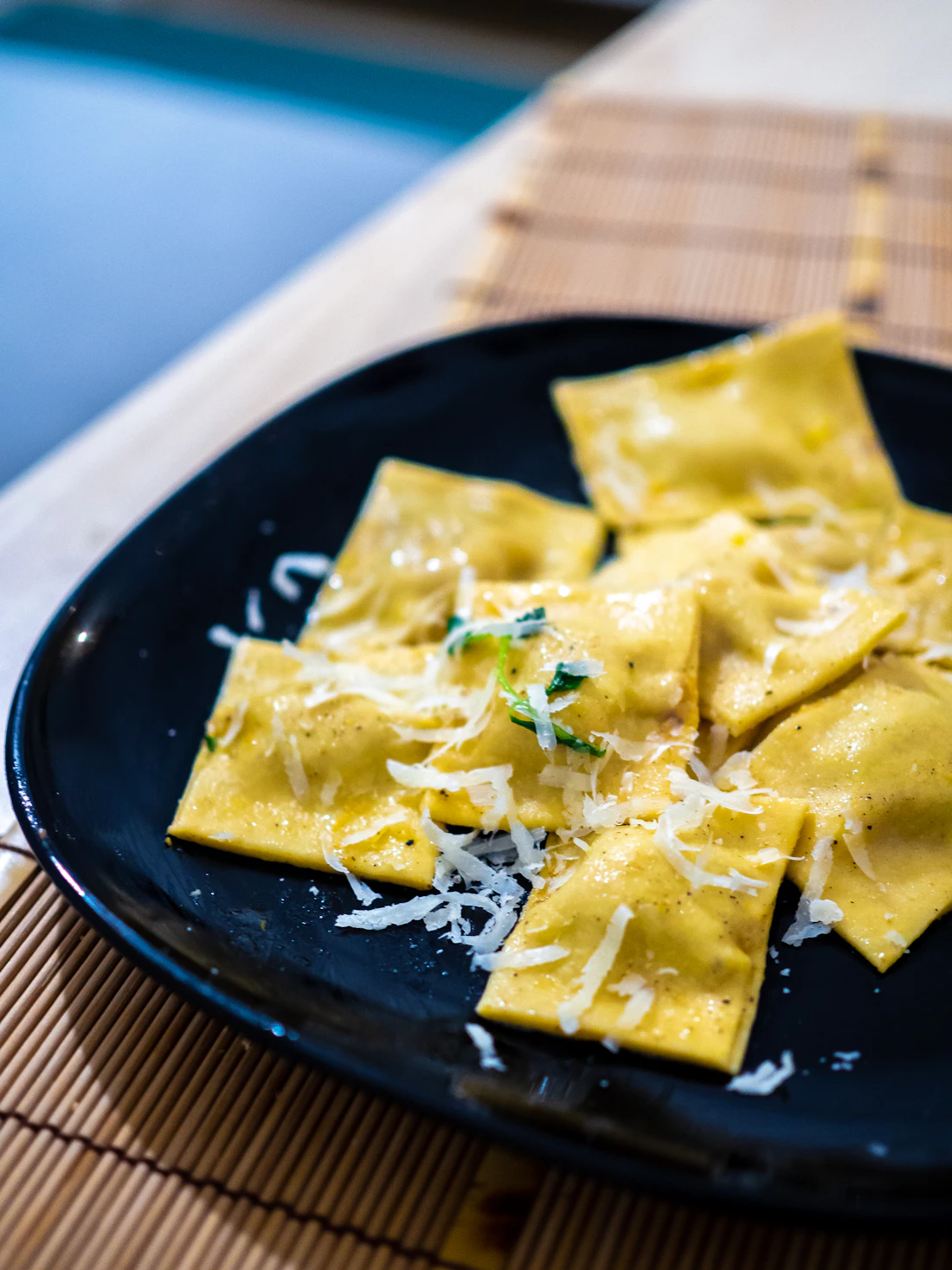 Fresh ravioli finished with shaved cheese
