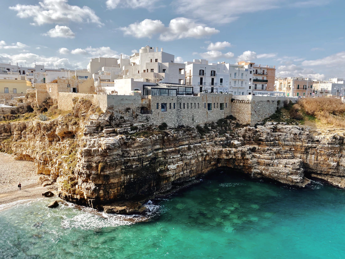 A whitewashed Puglian town perched over the sea
