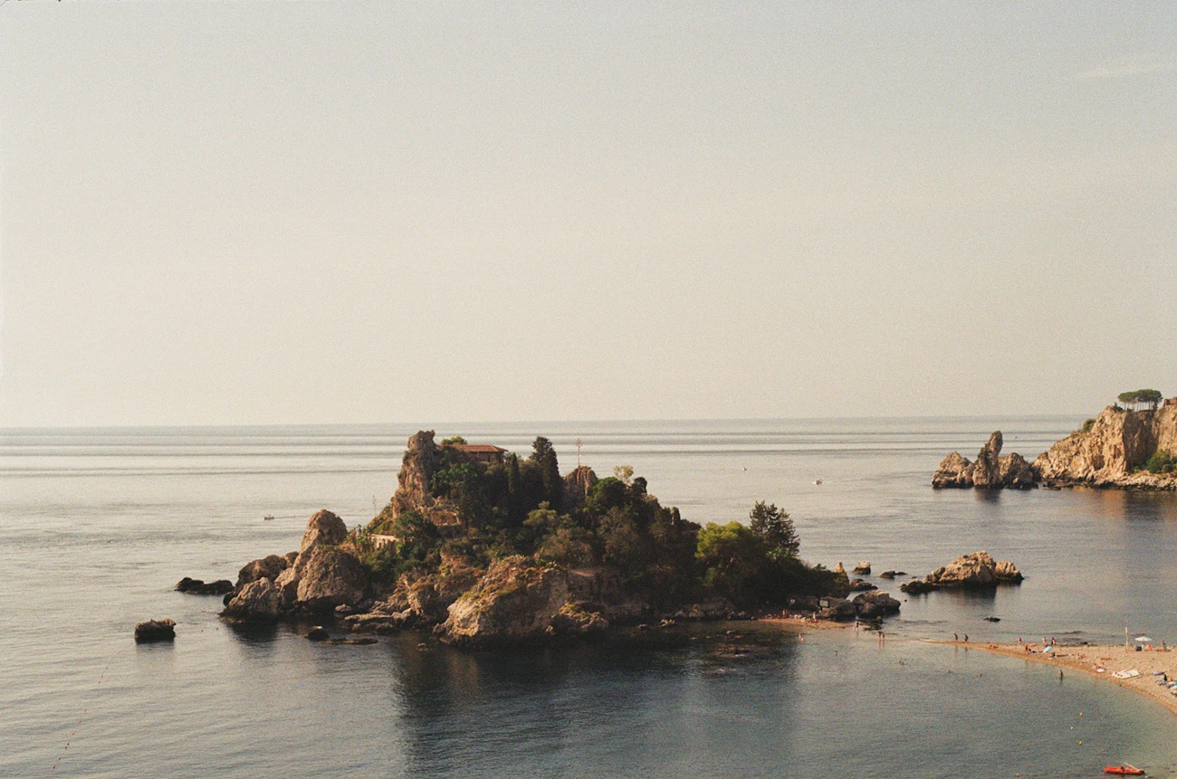Sea stacks glowing in warm Sicilian light
